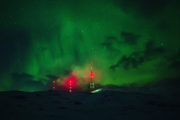 Naklejka premium Northern lights. Aurora borealis nature landscape at night