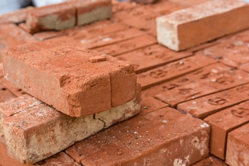 Close up pile of red bricks