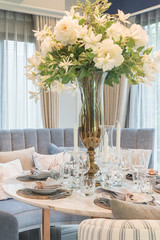 table set on round table dining in luxury dining room