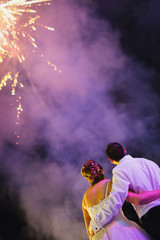 Couple watching fireworks in the sky