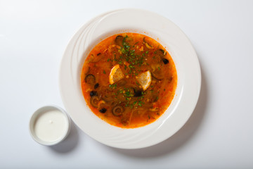 Homemade meat soup, Solyanka or saltwort.