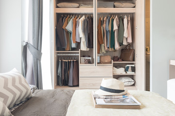 colorful clothes hanging on rail