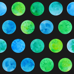 Obraz premium Hand drawn watrcolor circles of blue, green and yellow colors pattern on the dark background