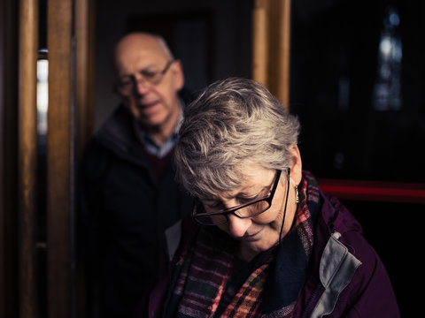 Senior couple exploring church
