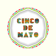 Cinco De Mayo card with bright ornate letters and round border with Mexican style ornament.