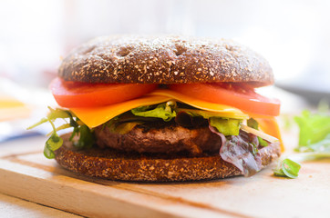 Homemade burger with beef and rye bread