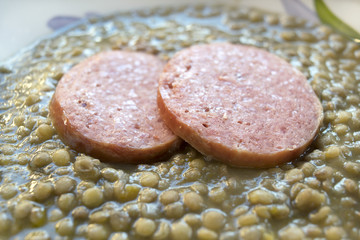 slices of cotechino with lentils