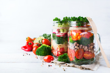 Healthy vegan salad in a mason jar with quinoa