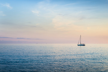 Fototapeta premium Rich evening color palette of sunset. Mediterranean Sea. Italy.