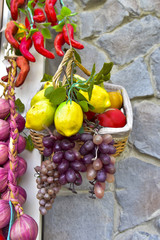 Spices and fruit mixed in basket for decoration
