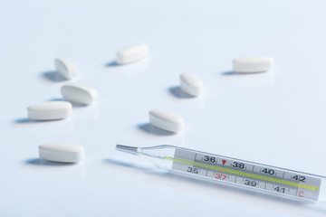 thermometer and pills