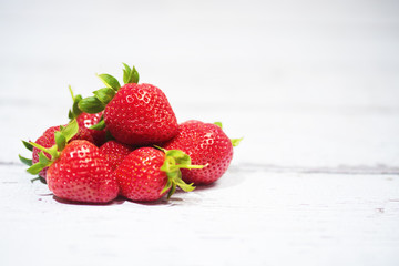Fresh Strawberries on White Wooden Background