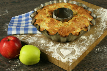 Homemade apple pie on a wooden table