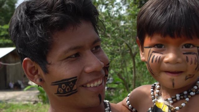 Father and Son at an indigenous tribe in the Amazon