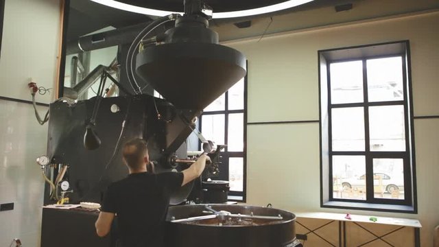 Worker in a coffee factory
