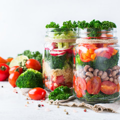 Healthy vegan salad in a mason jar with quinoa