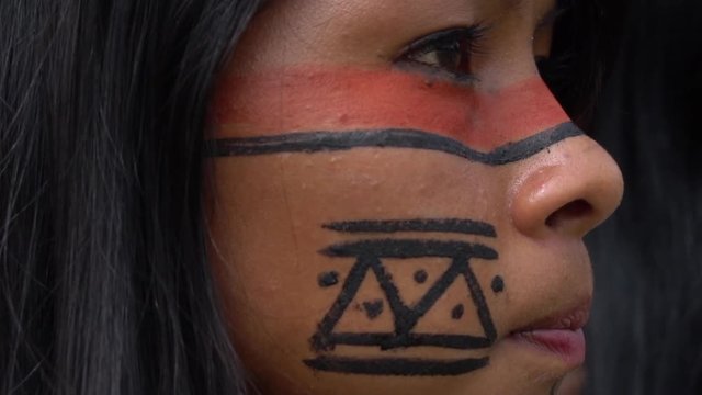 Closeup face of Native Brazilian Woman at an indigenous tribe in the Amazon