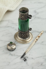 Moroccan green bottle with black kohl