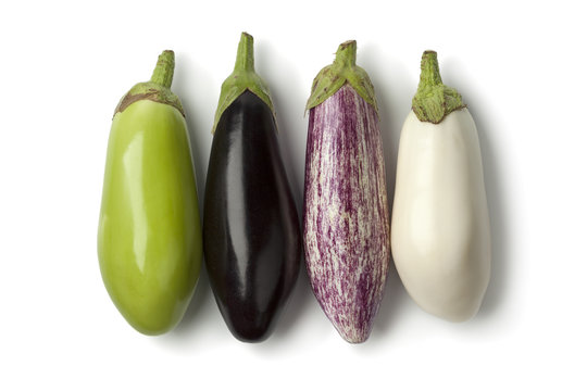 Variety of eggplants in a row