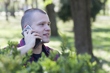 Portrait of a young man outdoors