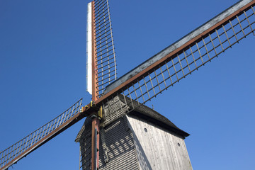 Windmill at Cassel, France, against a blue sky