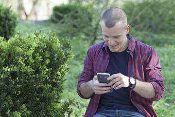 Portrait of a young man outdoors