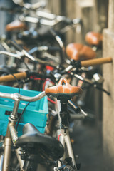 Obraz premium Leather saddle of old bicycle parked in the street of Budapest Jewish quarter, Hungary