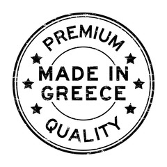 Grunge black premium quality made in Greece round rubber seal stamp on white background