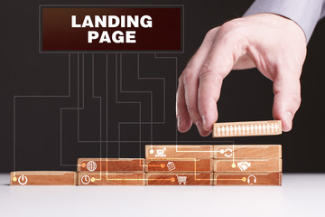 The concept of technology, the Internet and the network. Businessman shows a working model of business: Landing page