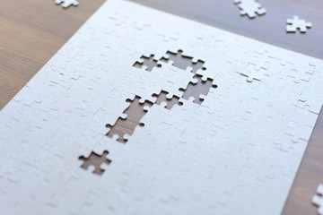 Question mark in the form of puzzles. Task and implementation. Business concepts