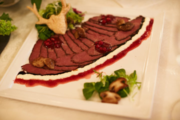 Sliced ham with lettuce, shallow depth, selective focus