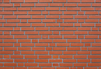horizontal part of orange brick wall
