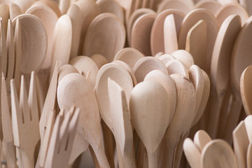 Wooden kitchen utensils background