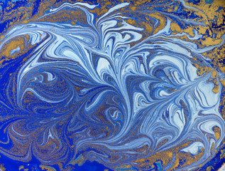 Blue and golden liquid texture. Watercolor hand drawn marbling illustration. Ink marble background.