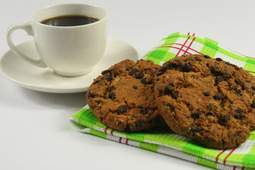 Coffee cup with oatmeal cookie chocolate on white background