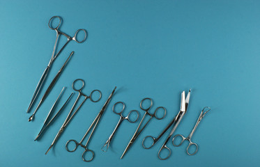 Surgical Instruments on blue background.