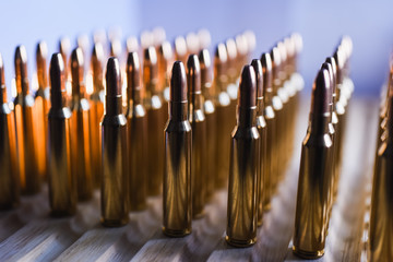 Brass metal bullet cartridge close-up 7.62 gauge caliber - obrazy, fototapety, plakaty