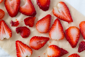 Red sliced Juicy and fresh strawberries. Summer food background for your design.