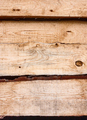 Brown background texture of  horizontal wooden planks logs bark
