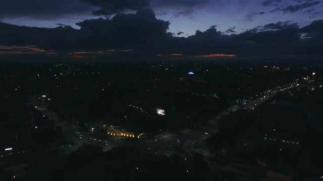 European city after sunset aerial night video