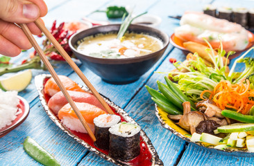 Various of asian meals on rustic background , top view , place for text.