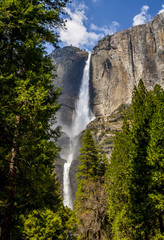 waterfall with trees, sky, clouds © Scott Bufkin