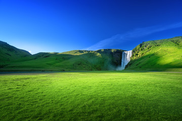 Fototapeta premium Skogarfoss waterfall and summer sunny day, Iceland