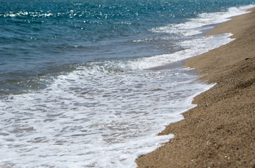 Sea on a sandy beach in europe
