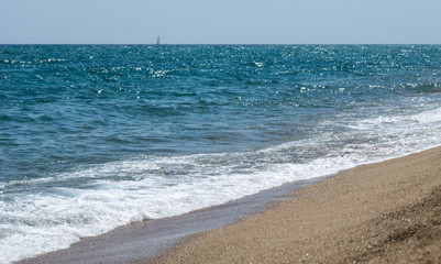 Sea on a sandy beach in europe