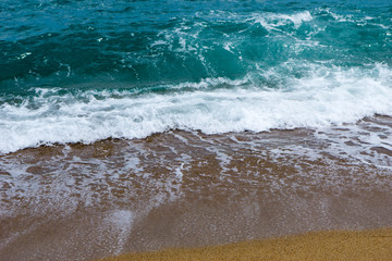 Sea on a sandy beach in europe