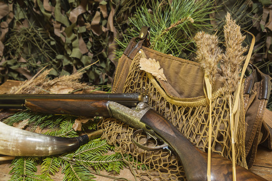 hunting still life/beautiful hunting rifle on camouflage