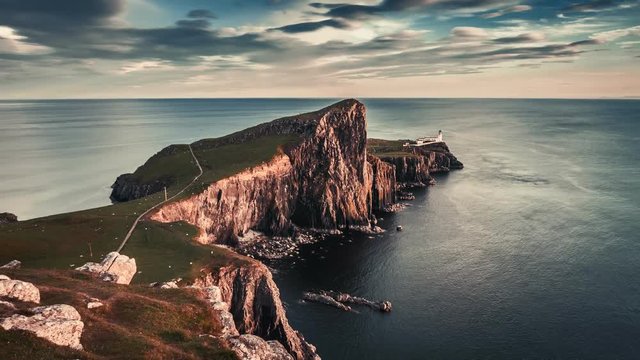 Stunning sunset at Neist point lighthouse, Scotland, United Kingdom, 4k, timelapse
