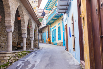 Beautiful view of scenic narrow alley with historic traditional houses in an old town in Europe