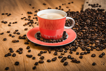 cappuccino with coffee beans